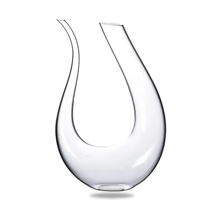 Decantador de Vinho Vinorium Casavelle em cristal premium formato U, design escultural e transparente sobre fundo branco.