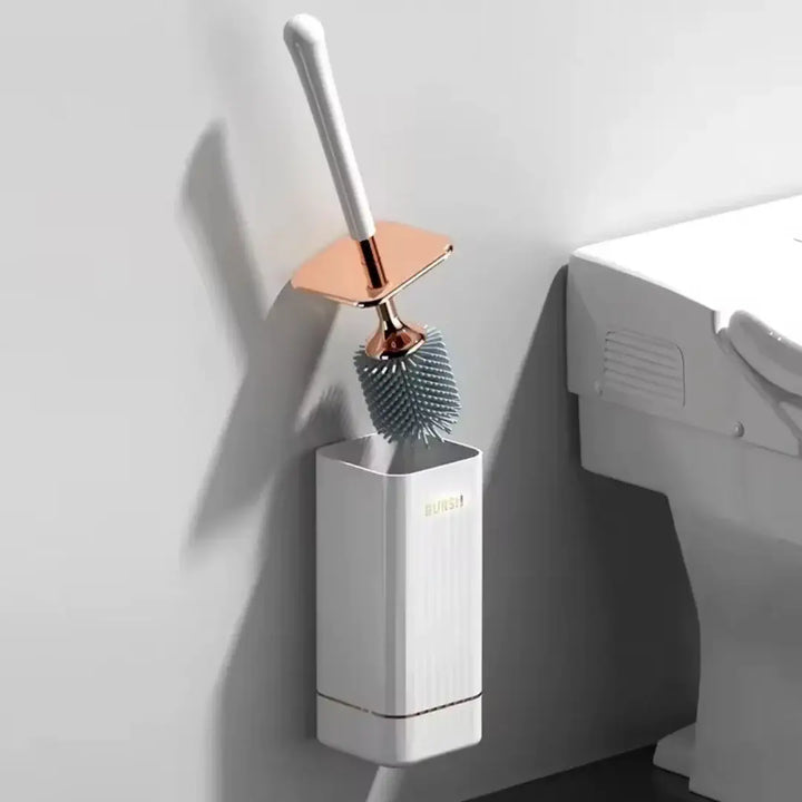 Escova sanitária de silicone com suporte moderno para banheiros elegantes
