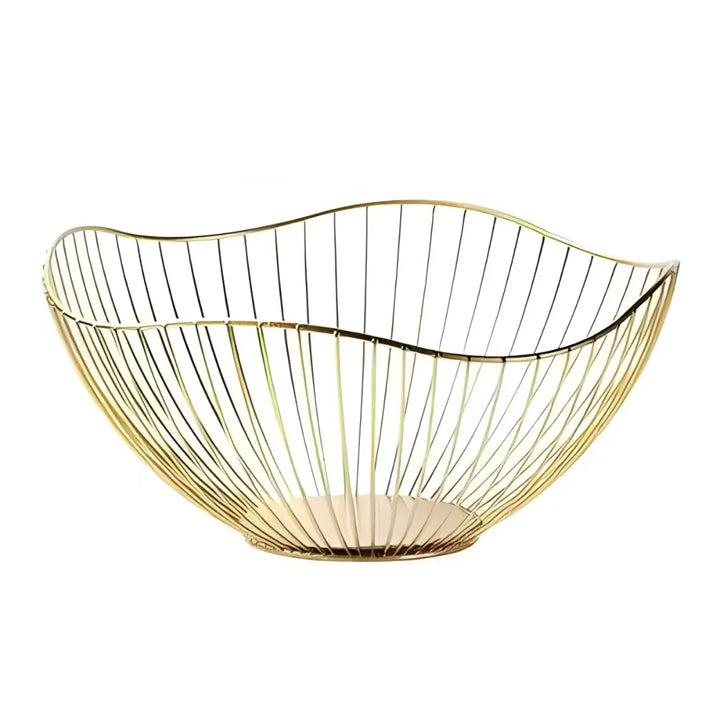Fruteira Royale Casavelle dourada em metal com design ondulado e estrutura aramada minimalista, símbolo de elegância moderna.